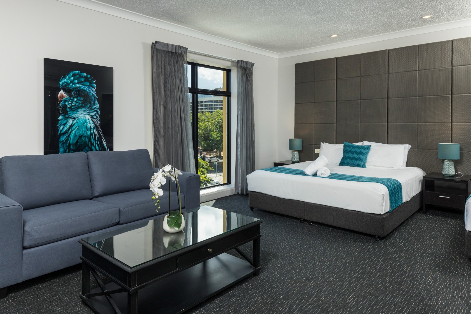 Deluxe King Suite living and bedroom area